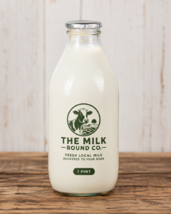 Home 1 pint whole milk in a glass bottle